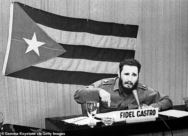Fidel Castro pictured giving a radio and televised speech during which he spoke about the measures taken by the U.S. regarding Cuba
