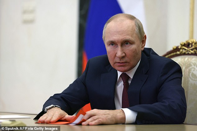 Russian president Vladimir Putin pictured chairing a Security Council meeting via a video link in Moscow this month
